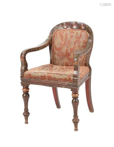 AN INDIAN POLYCHROME PAINTED ARMCHAIR