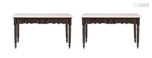 Y A PAIR OF ANGLO INDIAN EBONY CONSOLE TABLES WITH LATER MAR...