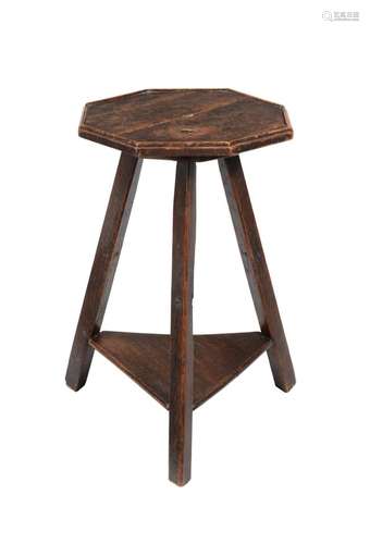 AN OAK OCTAGONAL TWO TIER OCCASIONAL TABLE