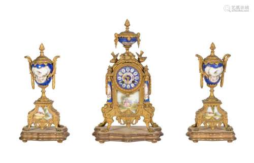 A FRENCH GILT SPELTER AND SEVRES STYLE PORCELAIN MANTEL CLOC...