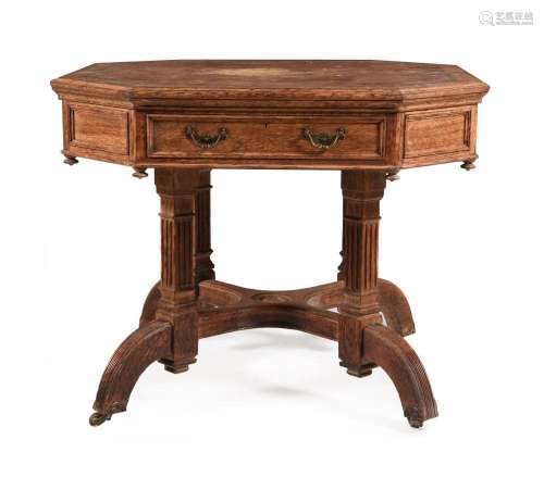 A VICTORIAN OAK OCTAGONAL CENTRE OR LIBRARY TABLE
