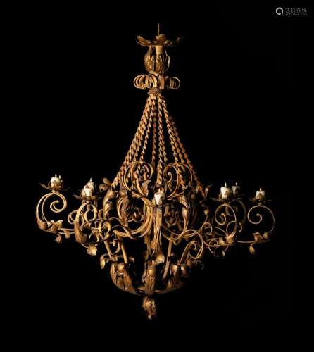 A CONTINENTAL YELLOW PAINTED WROUGHT IRON TEN LIGHT CHANDELI...