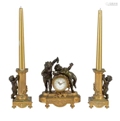 A FRENCH GILT AND PATINATED BRONZE CLOCK GARNITURE