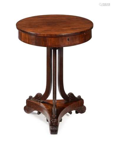 A REGENCY MAHOGANY CIRCULAR OCCASIONAL TABLE