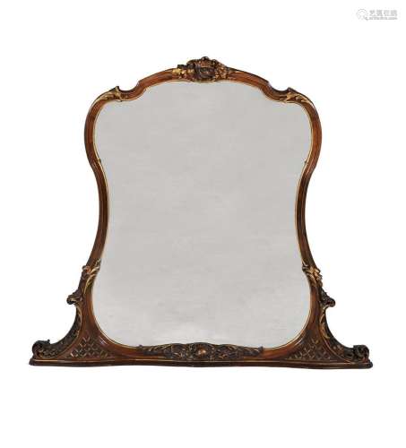 A WALNUT AND PARCEL GILT OVERMANTEL WALL MIRROR IN FRENCH TA...