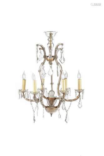 A CLEAR GLASS AND METAL SIX BRANCH CHANDELIER WITH PRISM DRO...