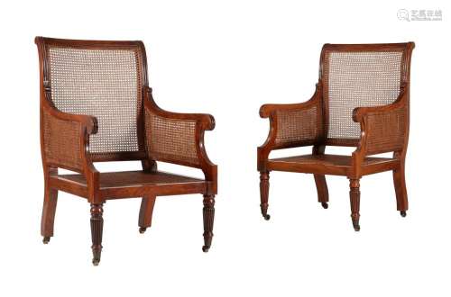 A PAIR OF MAHOGANY LIBRARY ARMCHAIRS IN REGENCY STYLE