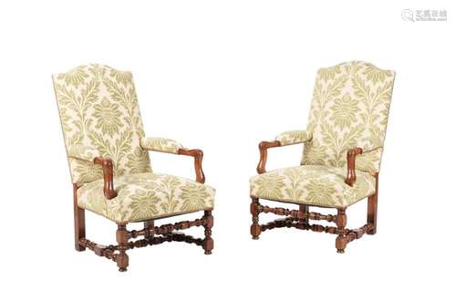 A PAIR OF WALNUT AND UPHOLSTERED OPEN ARMCHAIRS