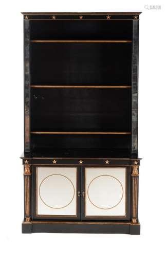 JULIAN CHICHESTER, AN EBONISED AND MIRRORED BOOKCASE IN REGE...