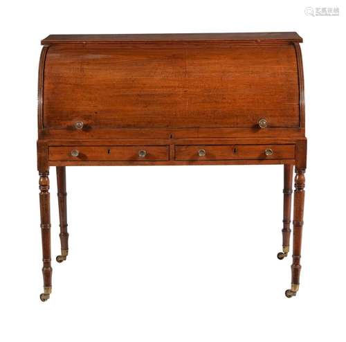 A GEORGE IV MAHOGANY CYLINDER WRITING DESK