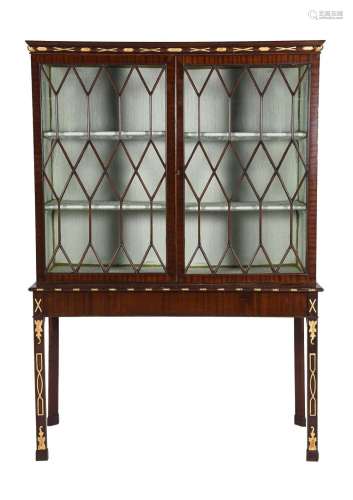 A MAHOGANY AND PARCEL GILT DISPLAY CABINET IN GEORGE III STY...