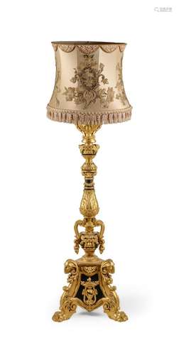 A GILTWOOD AND EBONISED TORCHERE IN 18TH CENTURY ITALIAN STY...