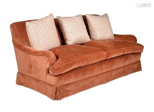 A COLEFAX AND FOWLER SOFA, IN THE MANNER OF HOWARD & SON...