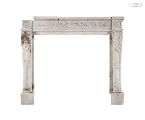 A CARVED WHITE MARBLE CHIMNEY PIECE