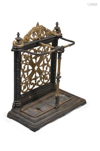 A LATE VICTORIAN CAST IRON AND PARCEL GILT STICK STAND, LATE...