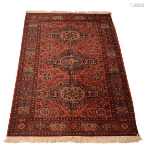 A WOOL RUG IN CAUCASIAN STYLE