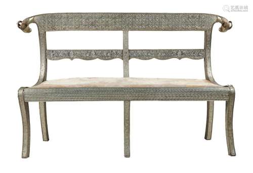 AN INDIAN SILVER COLOURED METAL SEAT