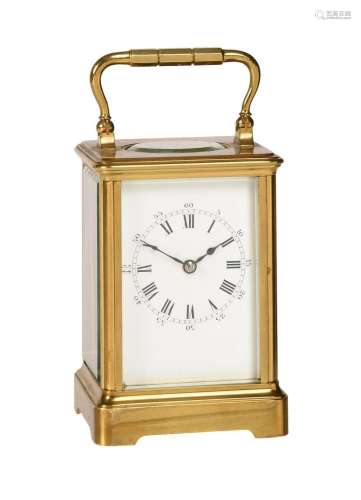 A FRENCH SMALL LACQUERED BRASS CARRIAGE TIMEPIECE