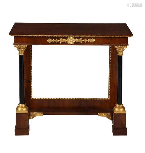 A MAHOGANY, EBONISED, AND PARCEL GILT CONSOLE TABLE IN EARLY...