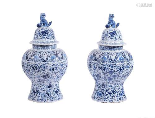 A PAIR OF DUTCH DELFT BLUE AND WHITE BALUSTER VASES AND COVE...