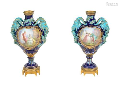 A PAIR OF FRENCH POTTERY SEVRES-STYLE GILT-METAL-MOUNTED TWO...