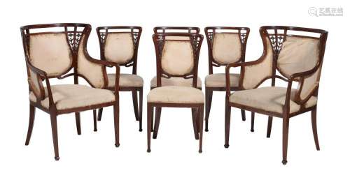 A SET OF EIGHT ART NOUVEAU MAHOGANY AND UPHOLSTERED DINING C...