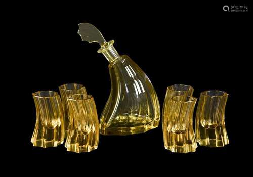 A MOSER AMBER COLOURED GLASS SPIRIT SET IN ART DECO TASTE