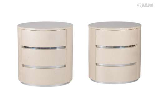 A PAIR OF CREAM LAMINATE BEDSIDE TABLES