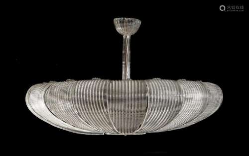 A NINE LIGHT GLASS CHANDELIER IN THE MANNER OF BAROVIER &...