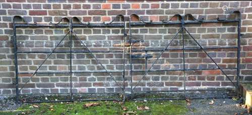 A PAIR OF BLACK PAINTED IRON GATES