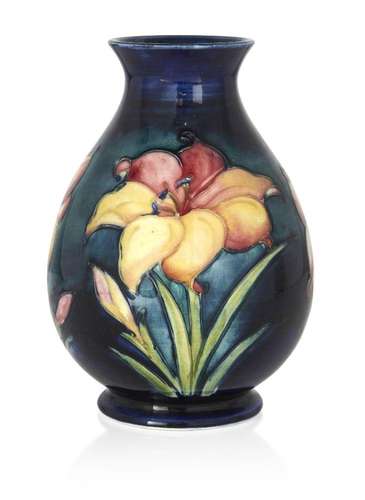 WILLIAM MOORCROFT (1872-1945), A FRESIA PATTERN CERAMIC VASE...