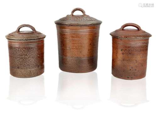 PETER STARKEY (BRITISH B.1945), THREE STONEWARE LIDDED JARS,...