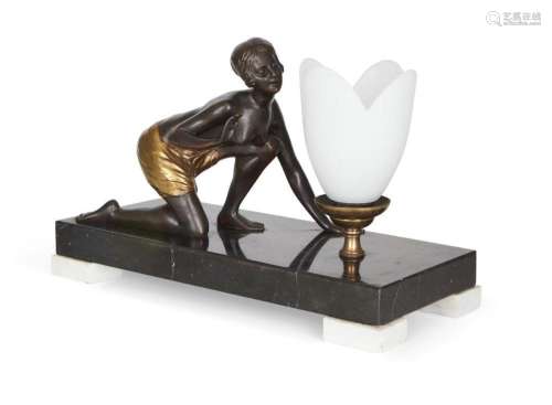 AN ART DECO PATINATED AND GILT-BRONZE FIGURAL TABLE LAMP, C....