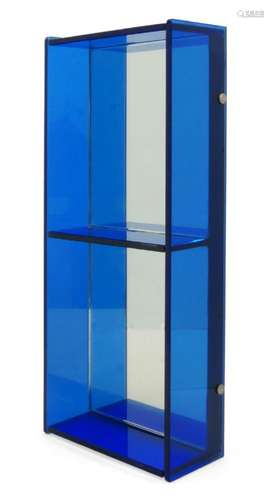 A BLUE GLASS AND MIRRORED WALL SHELF IN THE MANNER OF FONTAN...