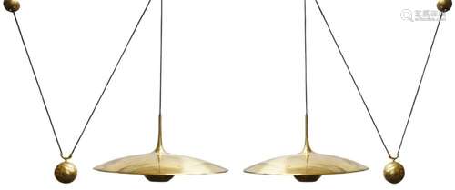 A PAIR OF COUNTERBALANCE BRASS PENDANT LIGHTS, C.2010, THE D...