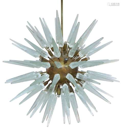 A LARGE BRASS STARBURST CHANDELIER, C.2010, COMPRISING BRASS...