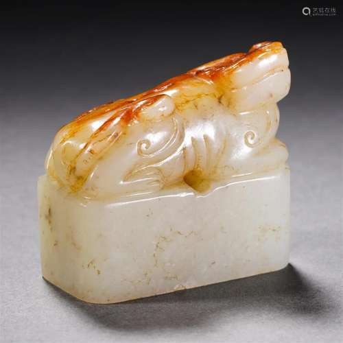 A Chinese Carved Creamy White Jade Seal