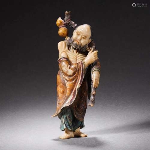 A Chinese Carved Soapstone Immortal