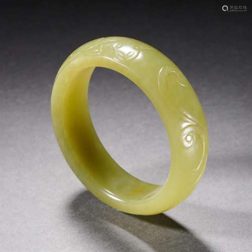 A Chinese Carved Yellow Jade bangle