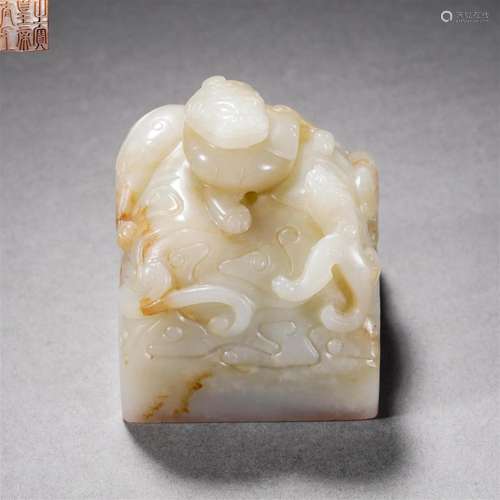 A Chinese Carved White Jade Beast Seal