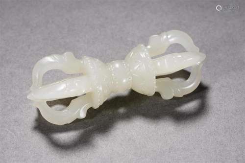 A Chinese Carved White Jade Vajra