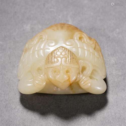 A Chinese Carved White Jade Garuda