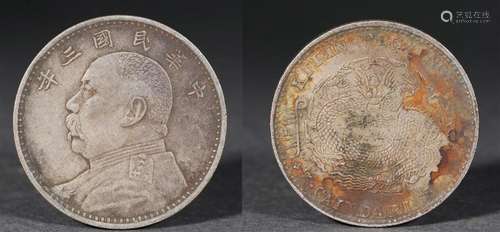 A Chinese Commemorative Silver Coin