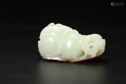 Carved White and Russet Jade Melon Pendant