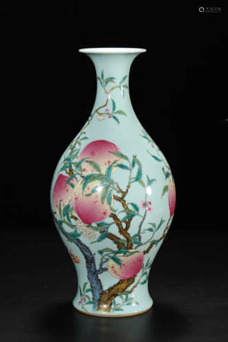 Green-Ground Famille Rose Guanyin-Form Peaches Vase