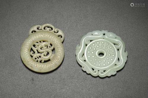 Two Carved Jade Dragon Pendants