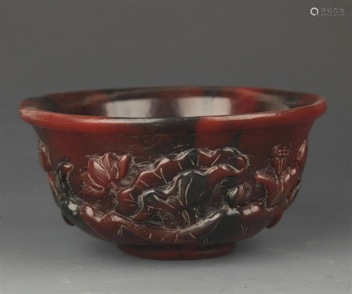 A FINELY CARVED LOTOS PATTERN BOWL