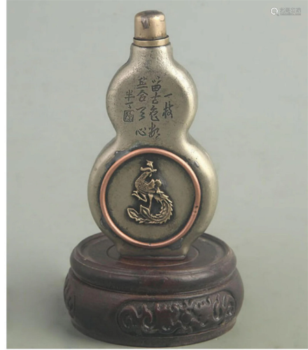 A FINE DRAGON CARVING BRONZE SNUFF BOTTLE