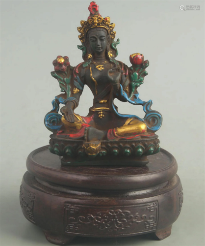 A FINELY COLORED GLASS MADE GREEN TARA GODDESS