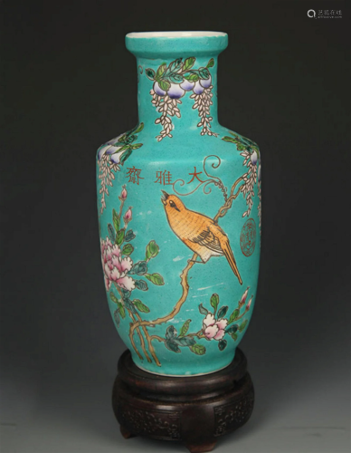 A TURQUOISE COLOR GROUND FAMILLE ROSE VASE